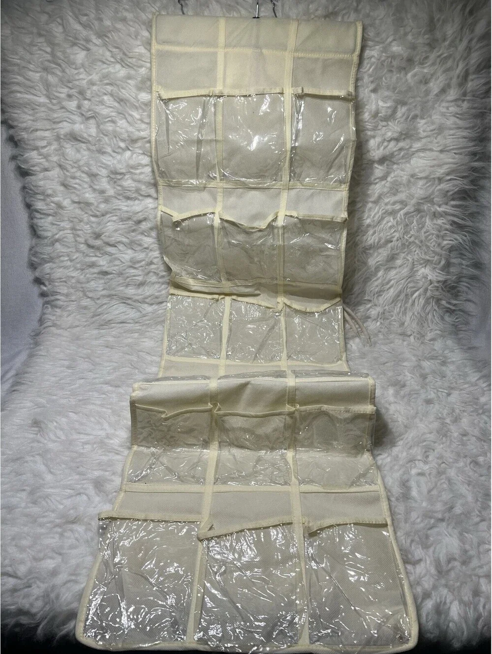 biege multi-pocket hanging closet organizer